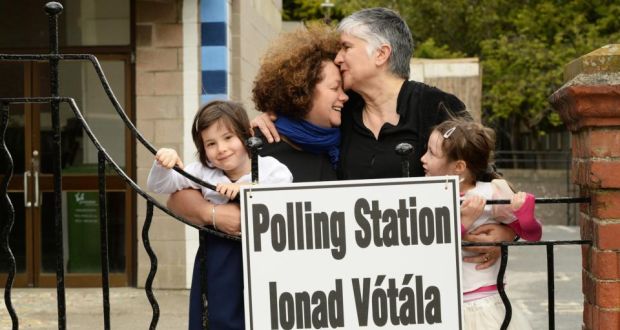 A beautiful 2-Mom family at a polling station before the vote was tallied. 