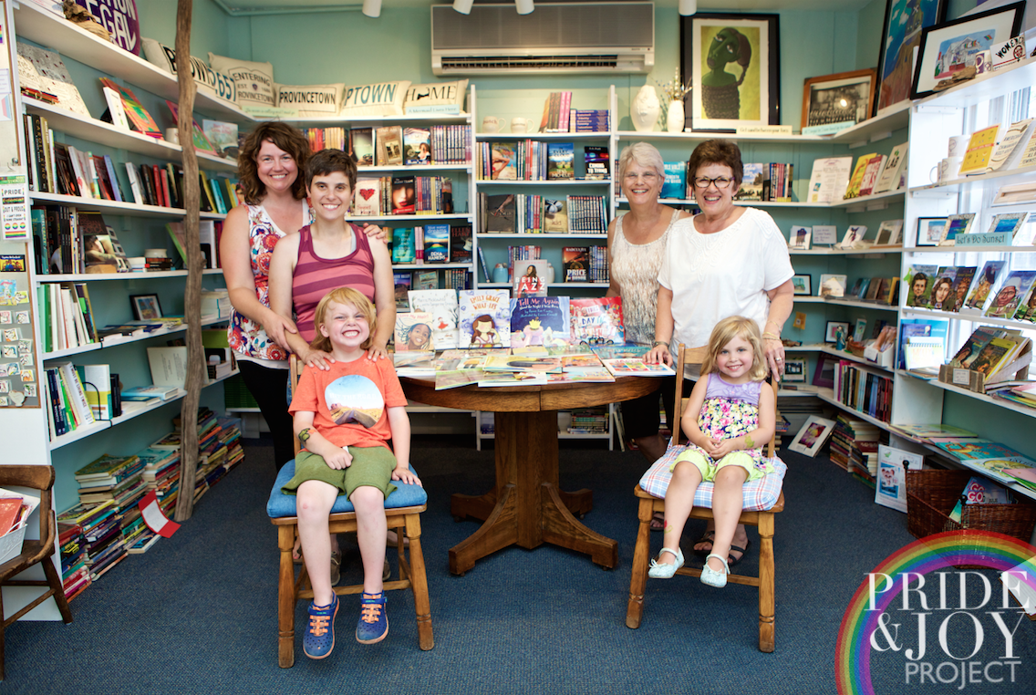 Wendy & Katherine with their family in Womencrafts. 2 generations of queer parents!