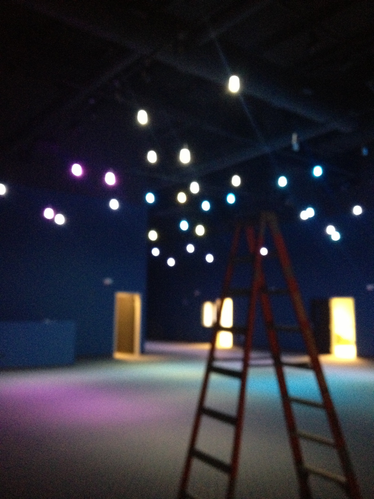 Ok-- I know this pic is blurry (camera not cooperating), but you've got to see the lights that they put in the elementary kids area. This place looks like the night sky. It is so cool!!