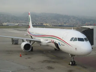 A MEA A321 with the Lebanese mountains in the background