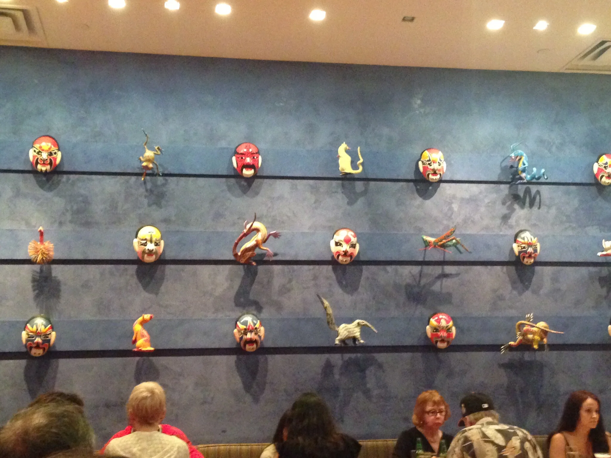 Masks on wall at China Poblano