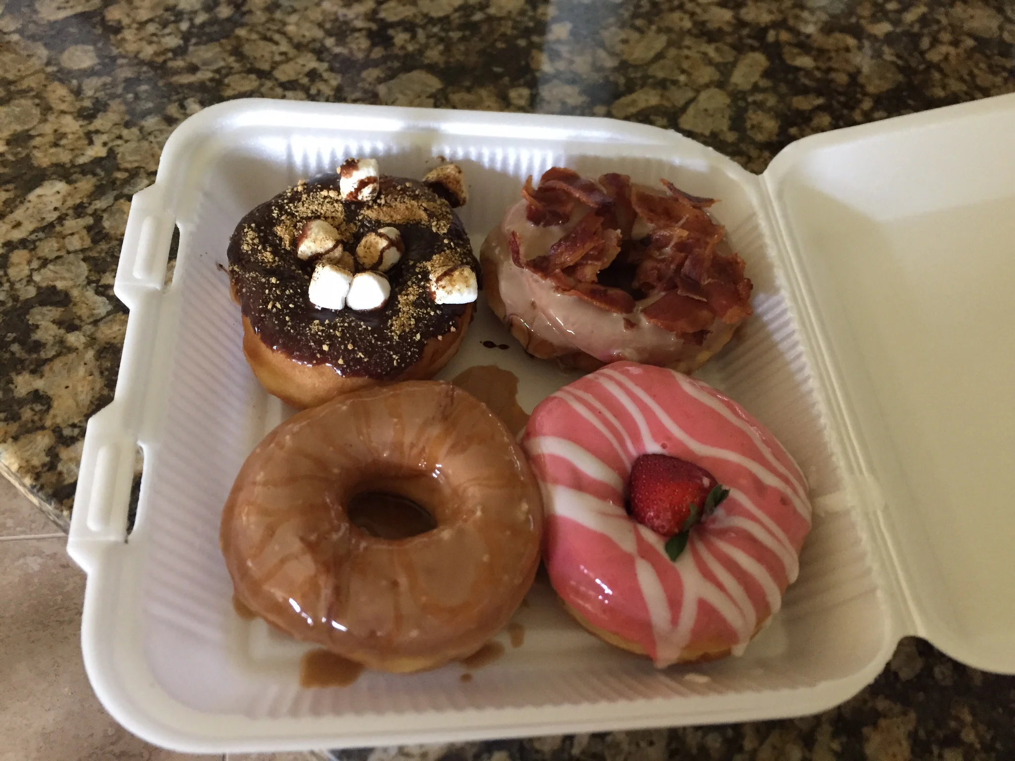 S'Mores, Maple Bacon, Caramel Macchiato, Strawberries and Cream Doughnuts