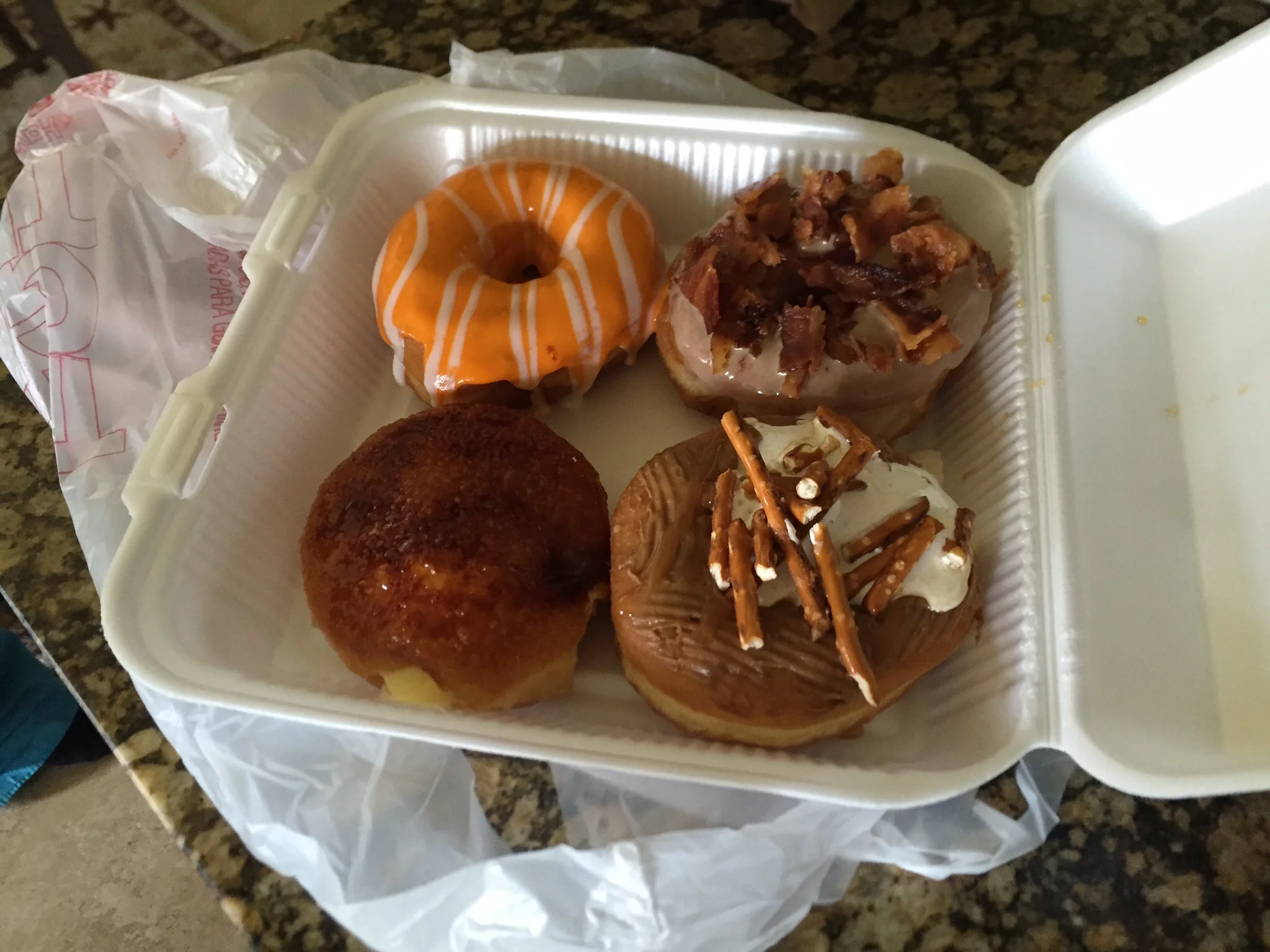 Dreamsicle, Maple Bacon, Creme Brûlée, Salted Caramel and Pretzel Doughnuts