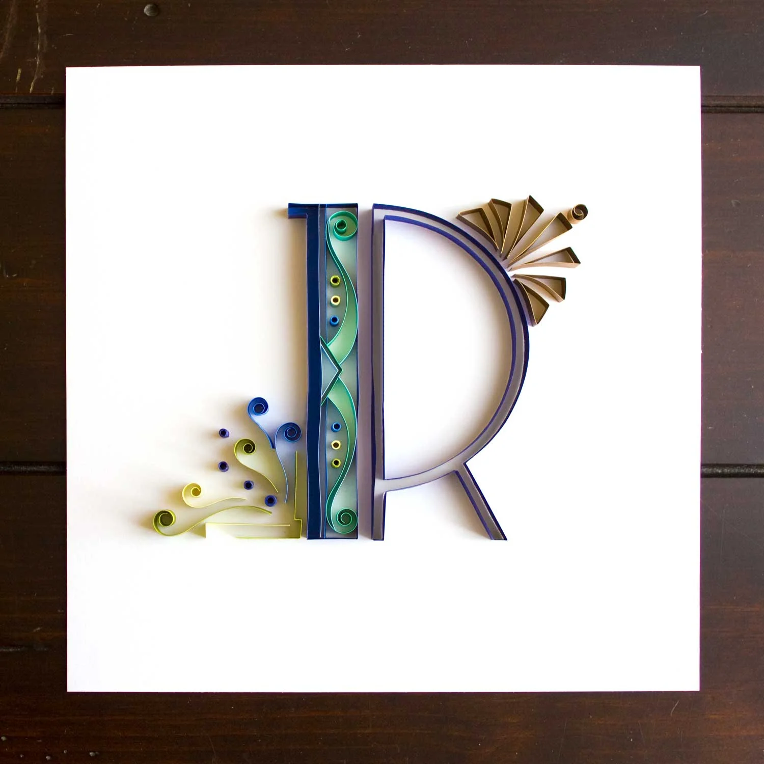 Letter R is the first letter I made for my classy favourite aunt. From the very first time you meet her, you will get a sense of her sophistication, but what you will never forget is her laughter. It is as if: If it isn't work time, we'd better be laughing our asses off! Oh she is a very fun person, always telling laugh-out-loud stories, and making funny remarks in whatever activity we do. In her 50's, she also went back to get bachelor's degree at the same time my mom did. And you can bet they had a blast every weekend class ;)