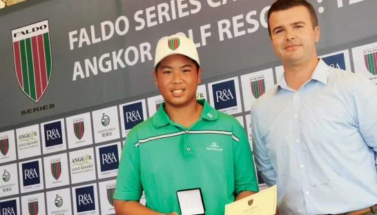 Overall winner Thongpipat Rattanayanon of Thailand receives a medal from David Baron, AGR’s director of golf. Photo supplied