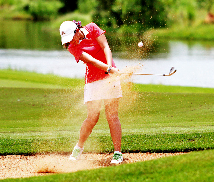 Thailand’s Bhenyapa Buranasiri plays a bunker shot during the opening round of the Faldo Series Asia event yesterday.