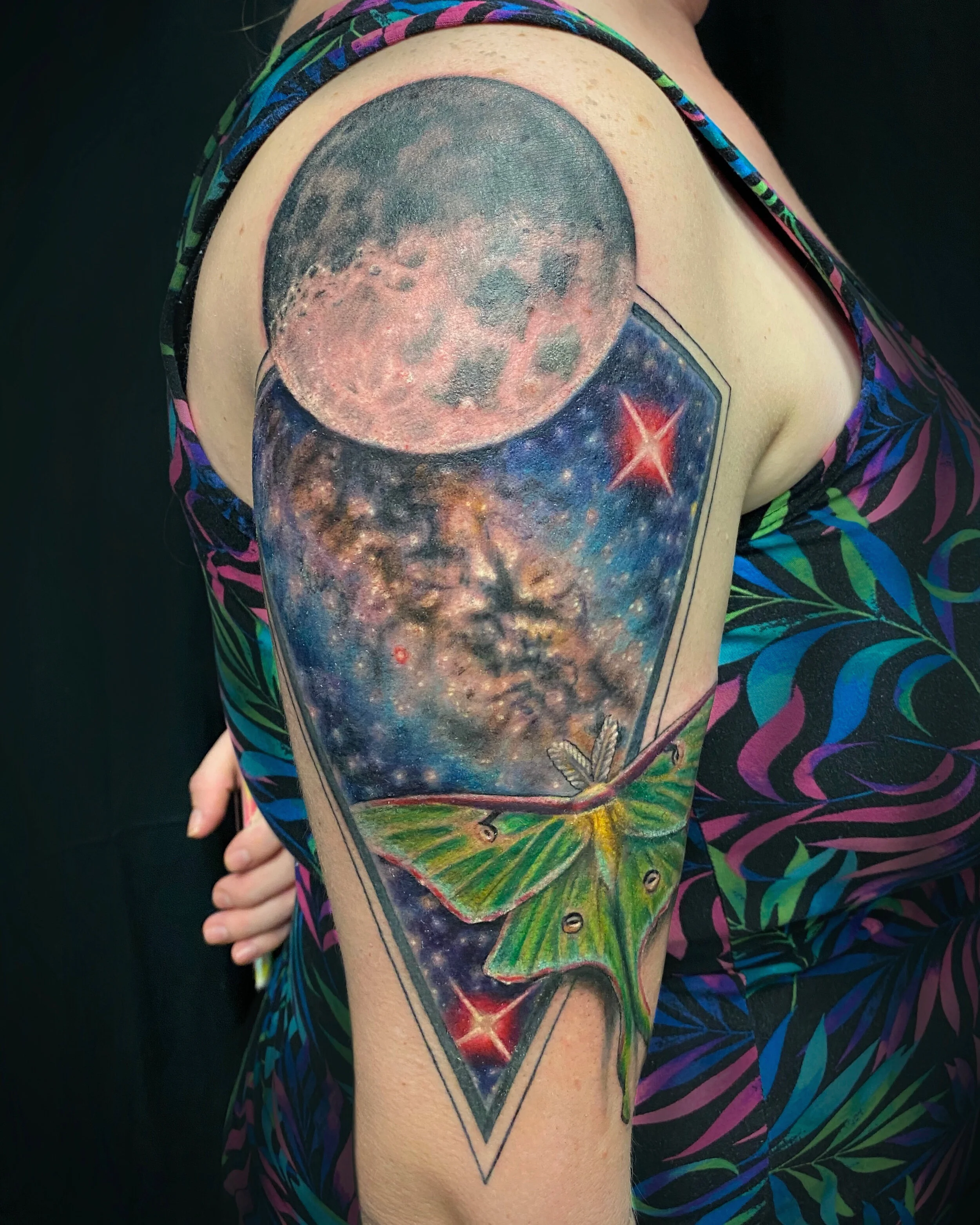 surreal color moon and butterfly arm tattoo, Austin by Andrew Matela
