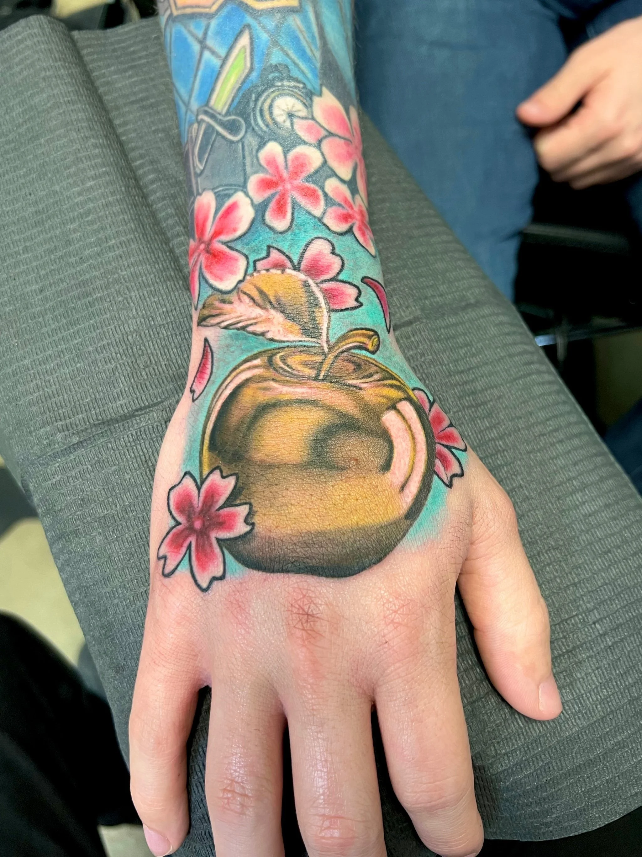 color floral hand tattoo with cherry blossoms, Austin by Andrew Matela