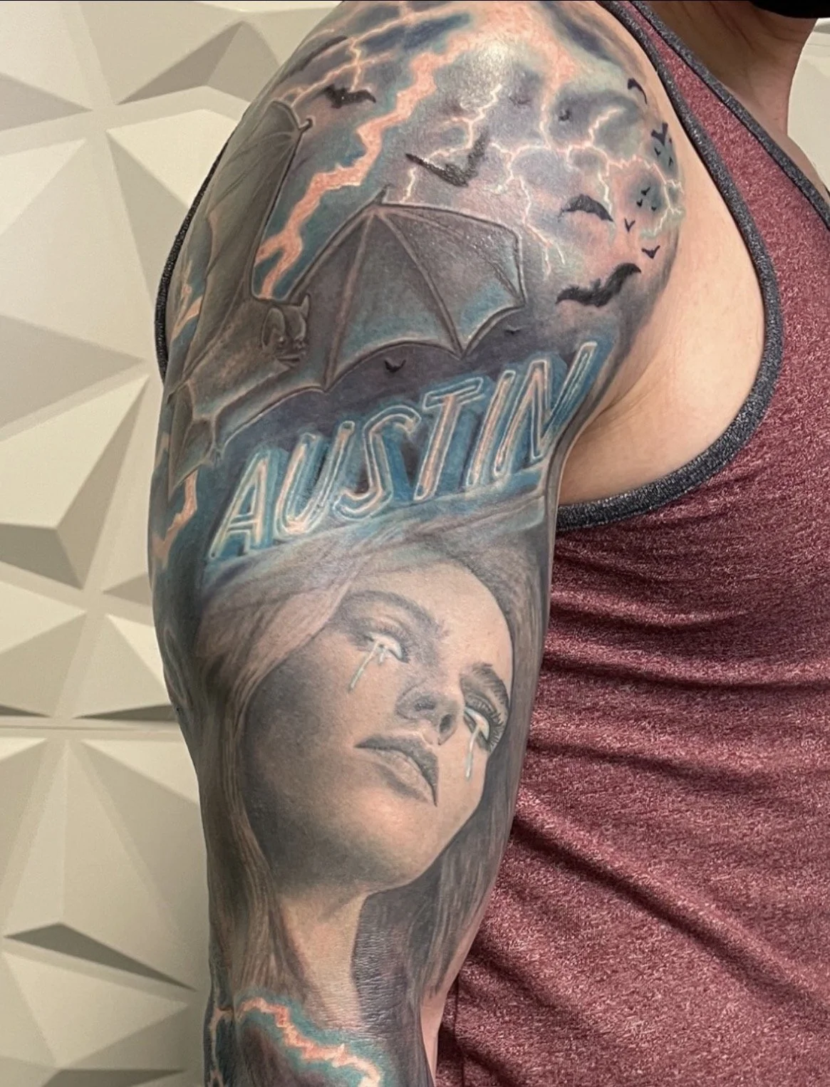 black and grey Austin bats lightning realism arm tattoo by Andrew Matela