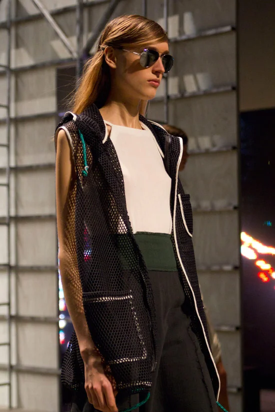 Sporty meets preppy with plenty of mesh at Band of Outsiders Spring 2014 .