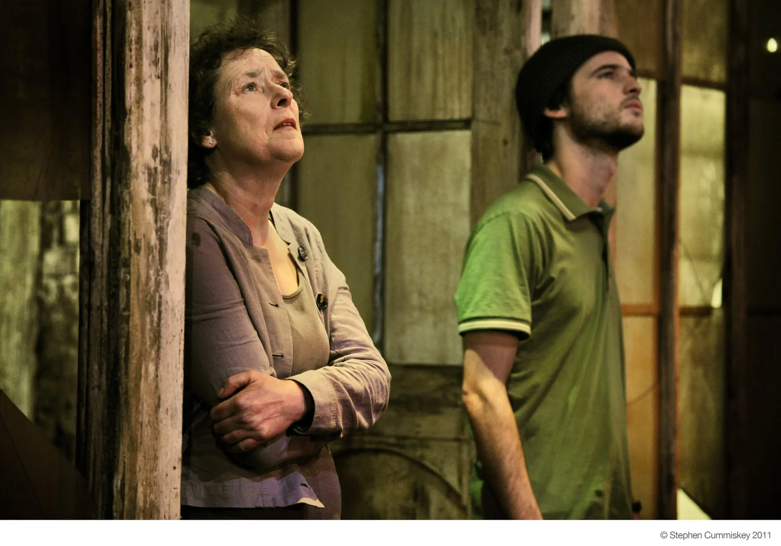 Linda Bassett and Tom Sturridge watching the planes