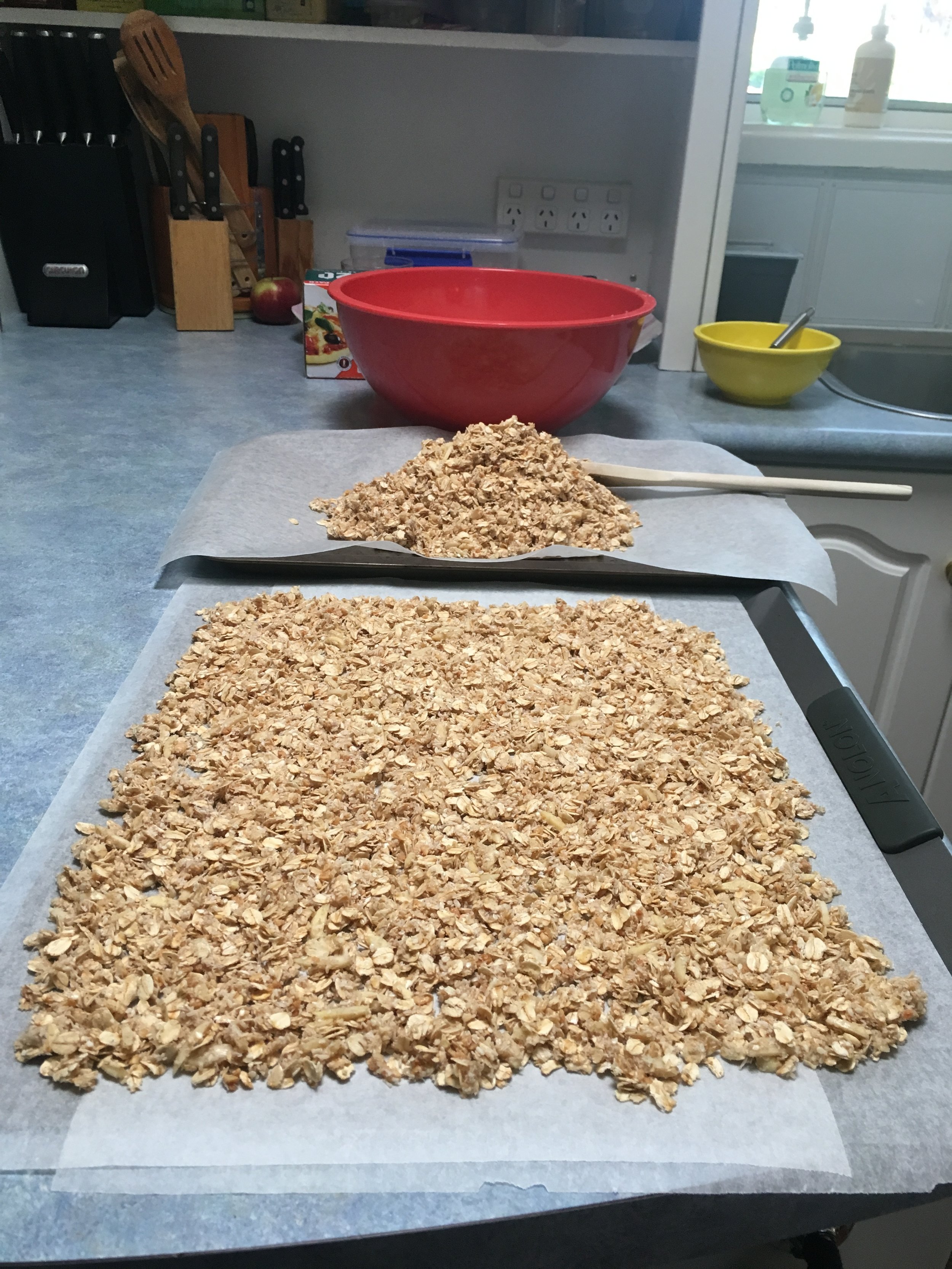 Divide mixture between baking sheets and spread thinly and evenly