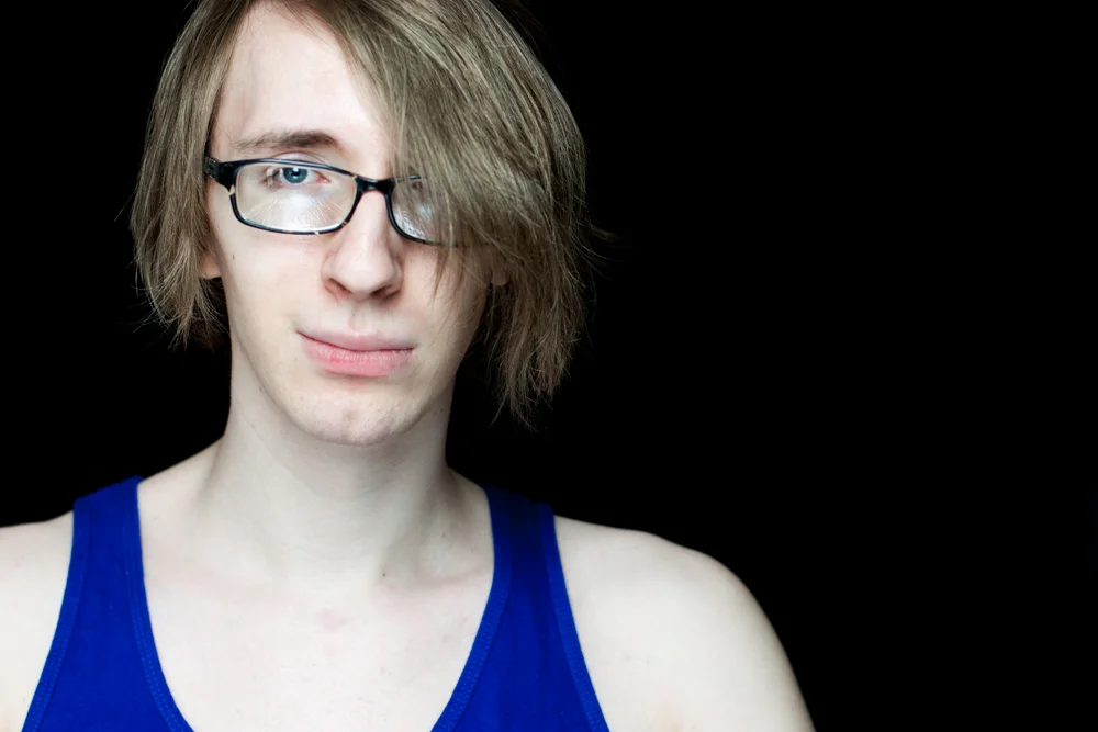 Day 10 of 30 Ways To Light A Portrait On A Black Backdrop Write Lighting.jpg