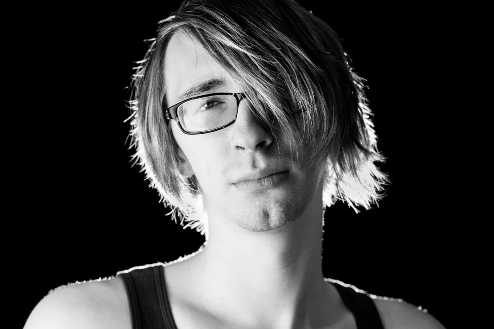 Day 14 of 30 Ways To Light A Portrait On A Black Backdrop Write Lighting.jpg