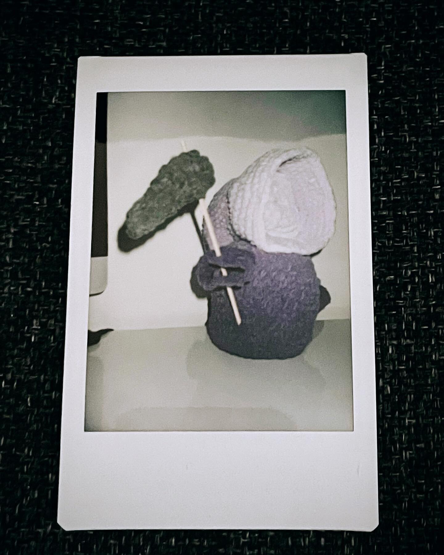 Day 45 - 10/15/23 - Reaper. 

Mandy made the most adorable looking grim reaper for me using this cool looking purple to white ombr&eacute; yarn. It turned out so awesome that she decided to make a mini one and give it butt checks because Mandy 😂. 

