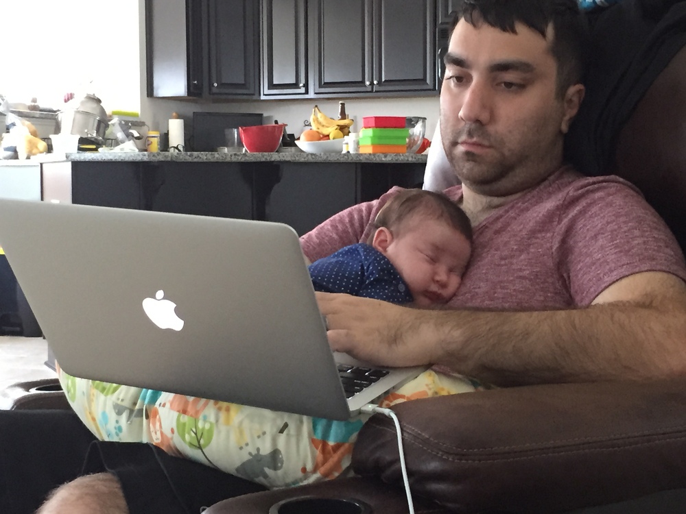  Helping Daddy work from home. 