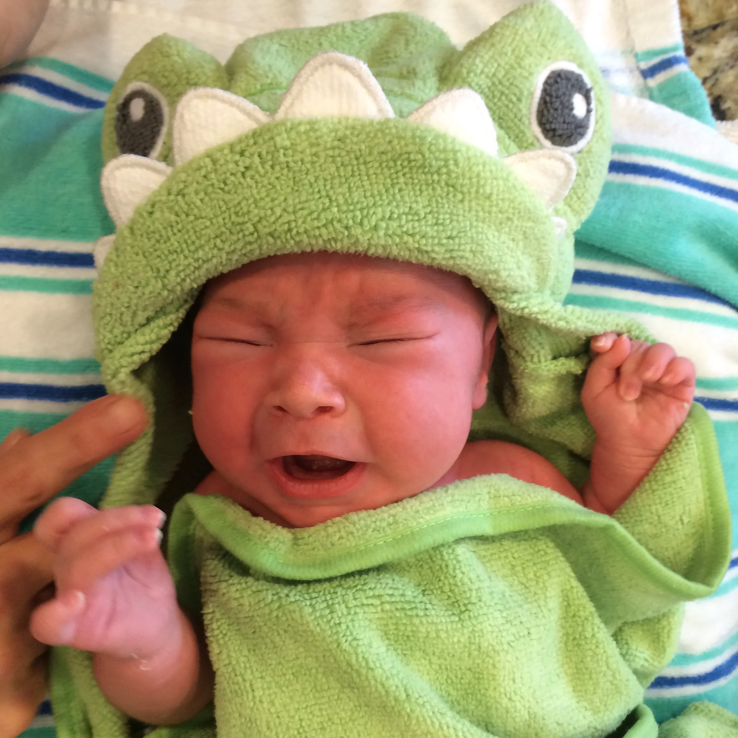 First month = first bath. No worries, we've worked out the kinks. You're no longer convinced we're trying to peel you skin off with acid during bath time.