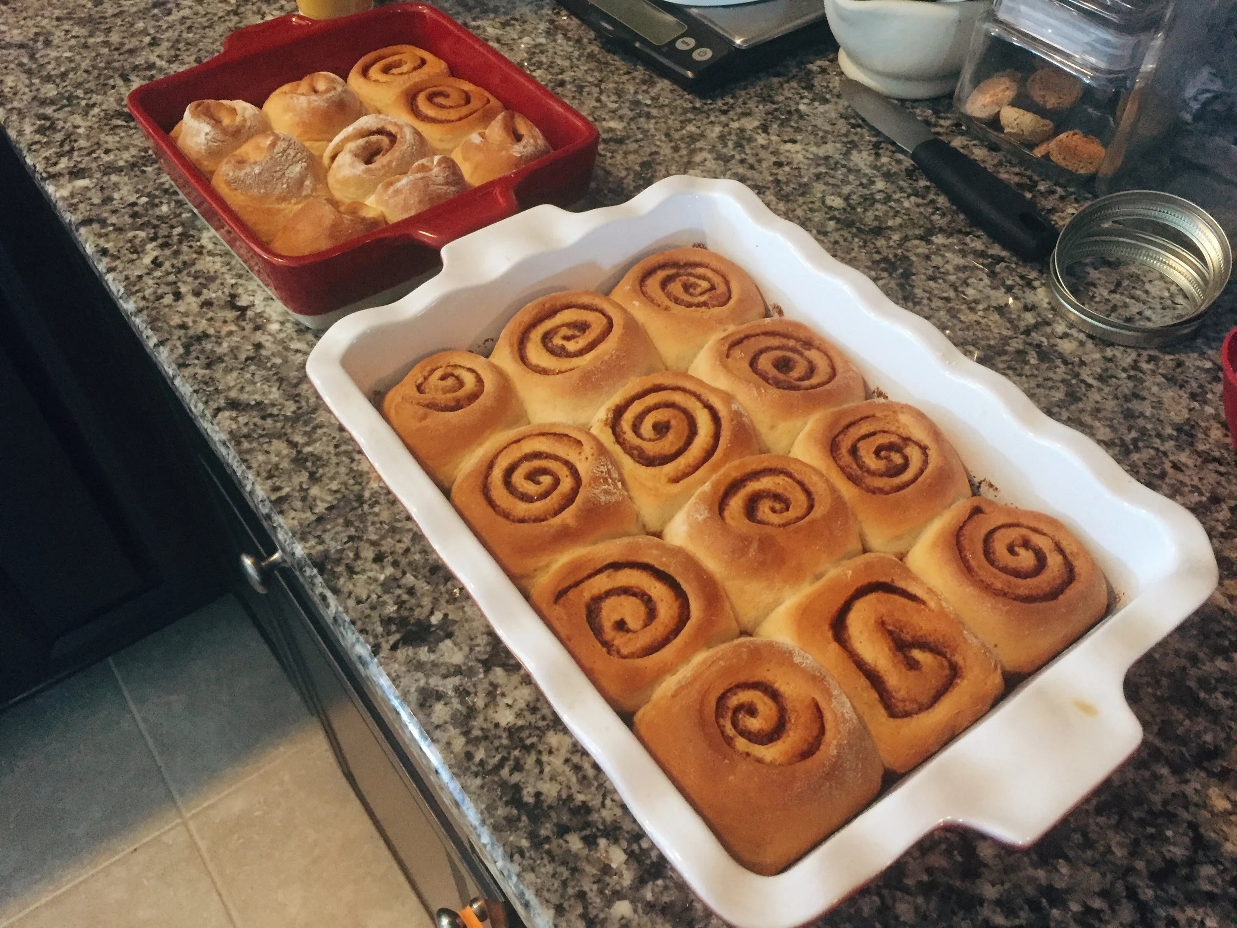 Hot from the oven, I always take a moment to admire the swirls. These are the "leftover rolls", the pieces that came from the end of the rolls and weren't pretty enough to give to the church breakfast. My family was kind enough to eat them for me. 