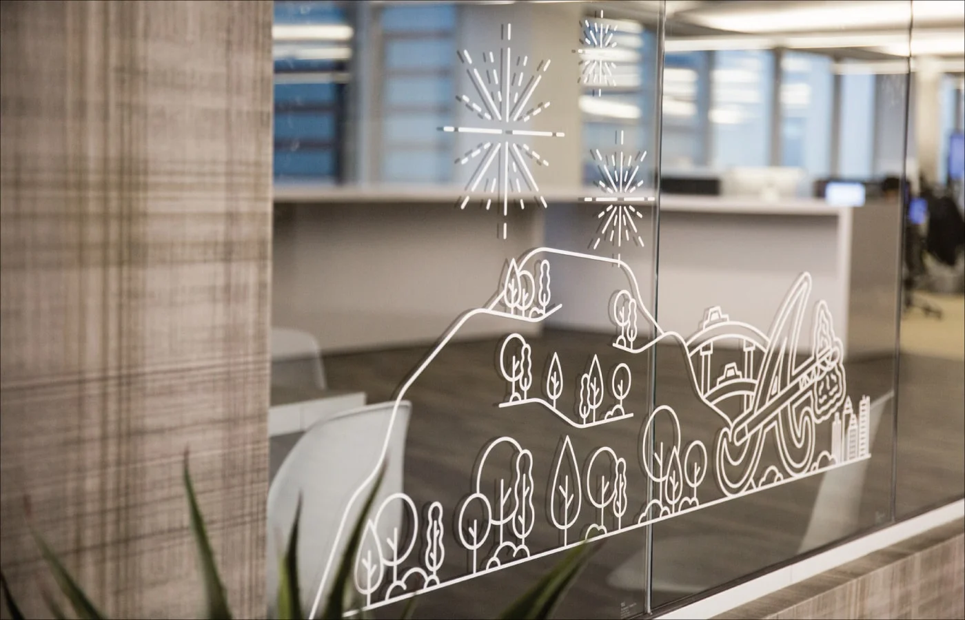 Illustrations of Atlanta neighborhoods. The illustrations were applied as vinyl decals to each ShootProof conference room window.