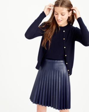 Lightweight Wool Cardigan Made from lightweight merino wool with a slightly shorter fit and finished with grosgrain ribbon trim and gold buttons, this is the easy wear-everywhere cardigan you'll usually find over the back of our chair, or draped over our shoulders, or tucked into our handbag...you get the gist. J.CREW $85