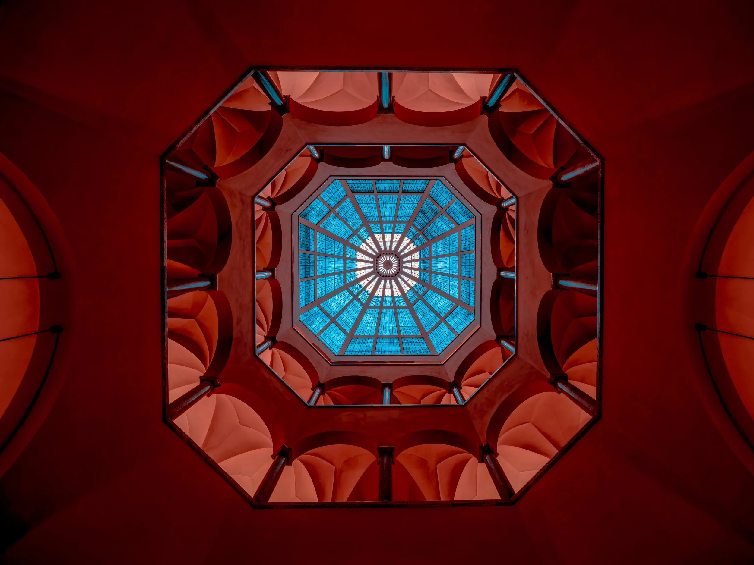 An ornate, golden stage inside a grand opera house with multiple seating tiers and intricate architectural details, preparing for a performance.