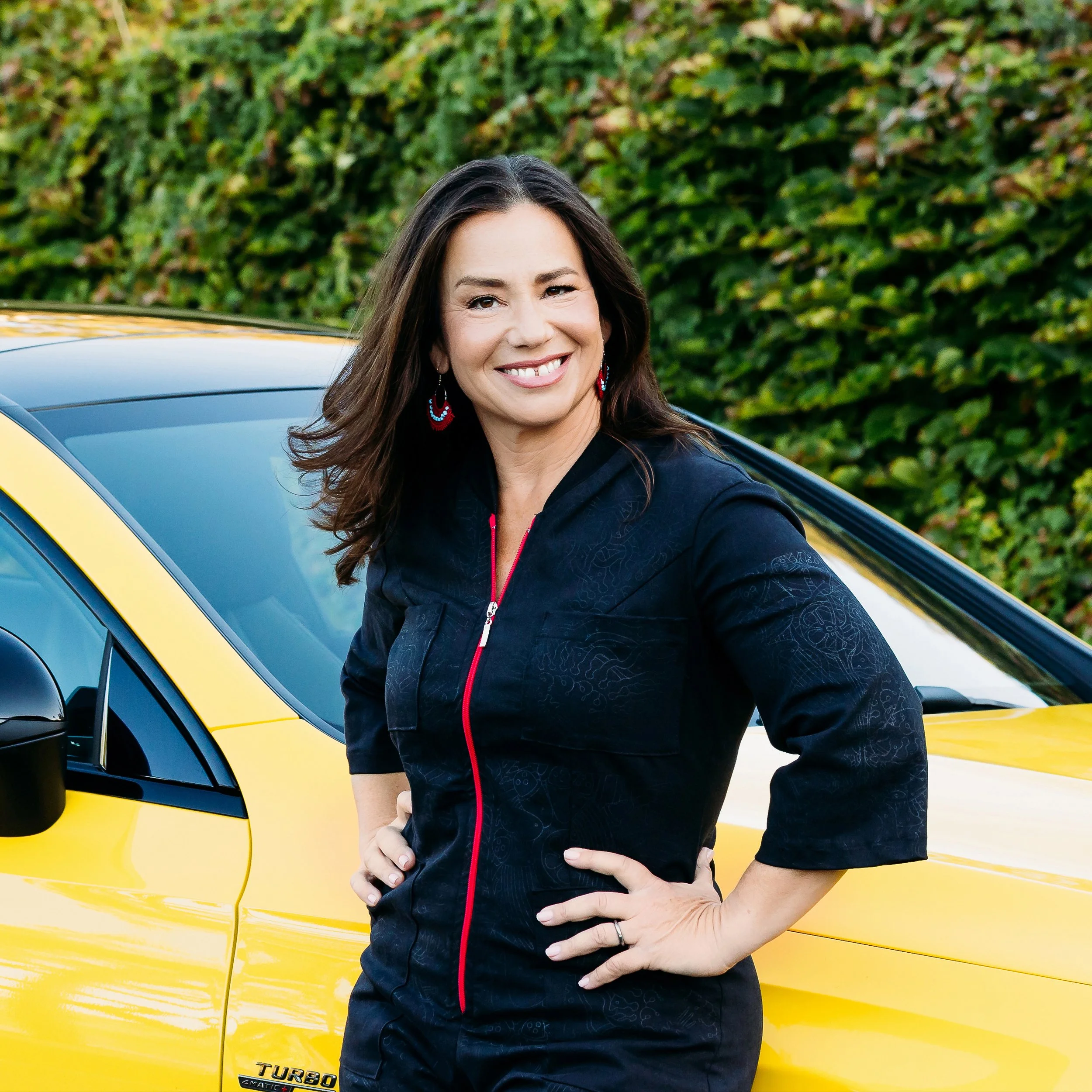 Halelly Azulay with yellow car