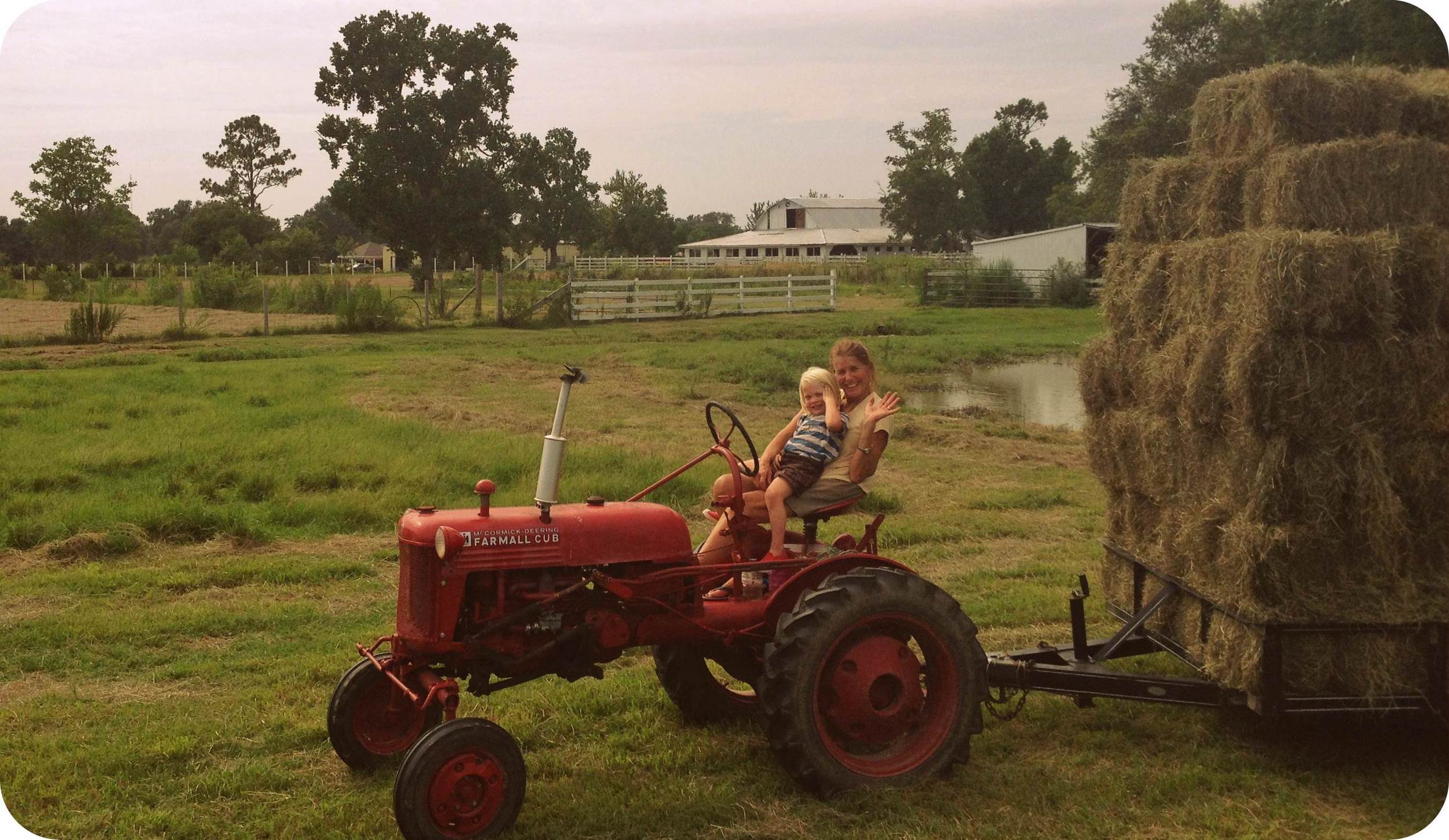 mom and kai on tractor edit.jpg