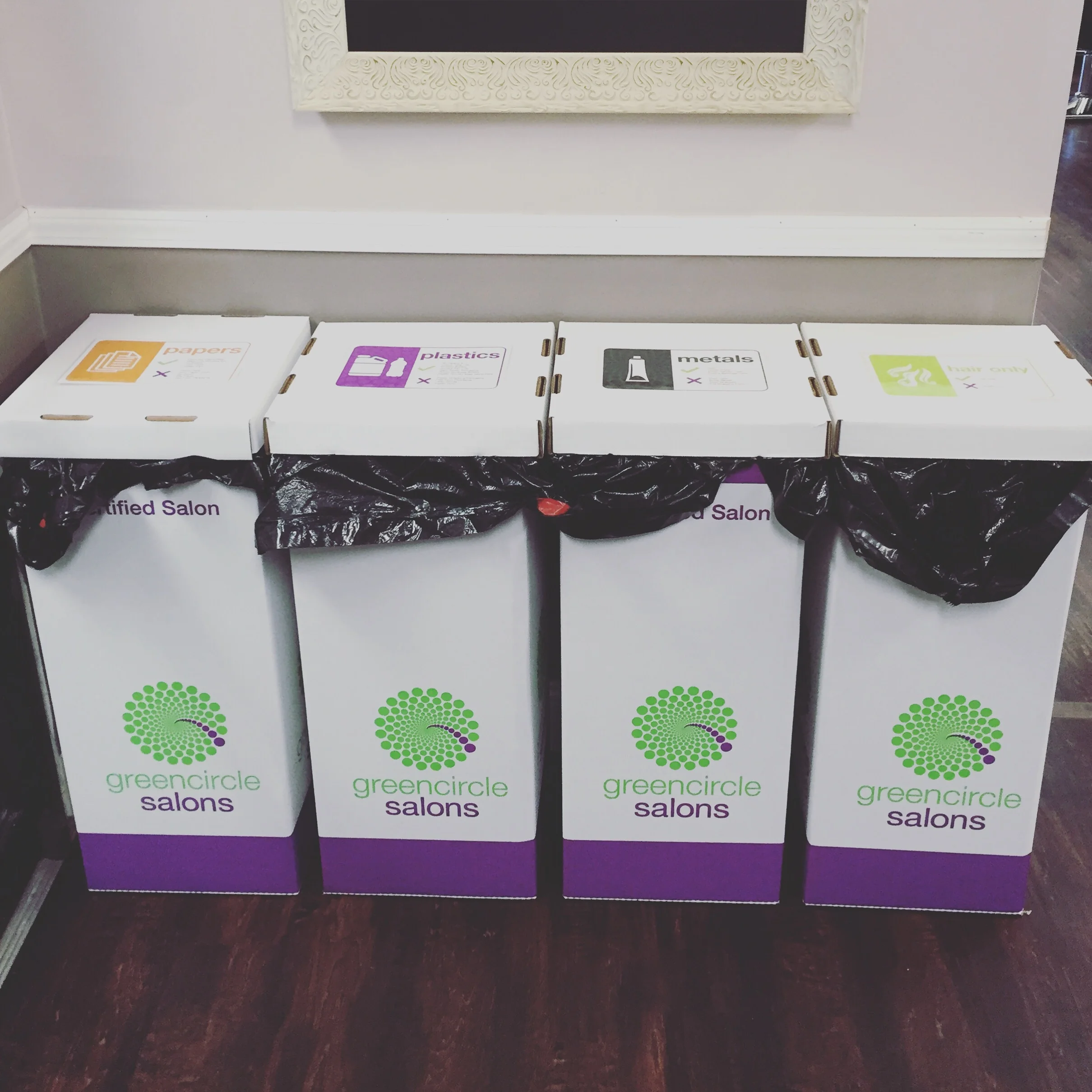 Our new Green circle recycling bins! Hair, paper, metal, plastics, & leftover chemical are all taken!