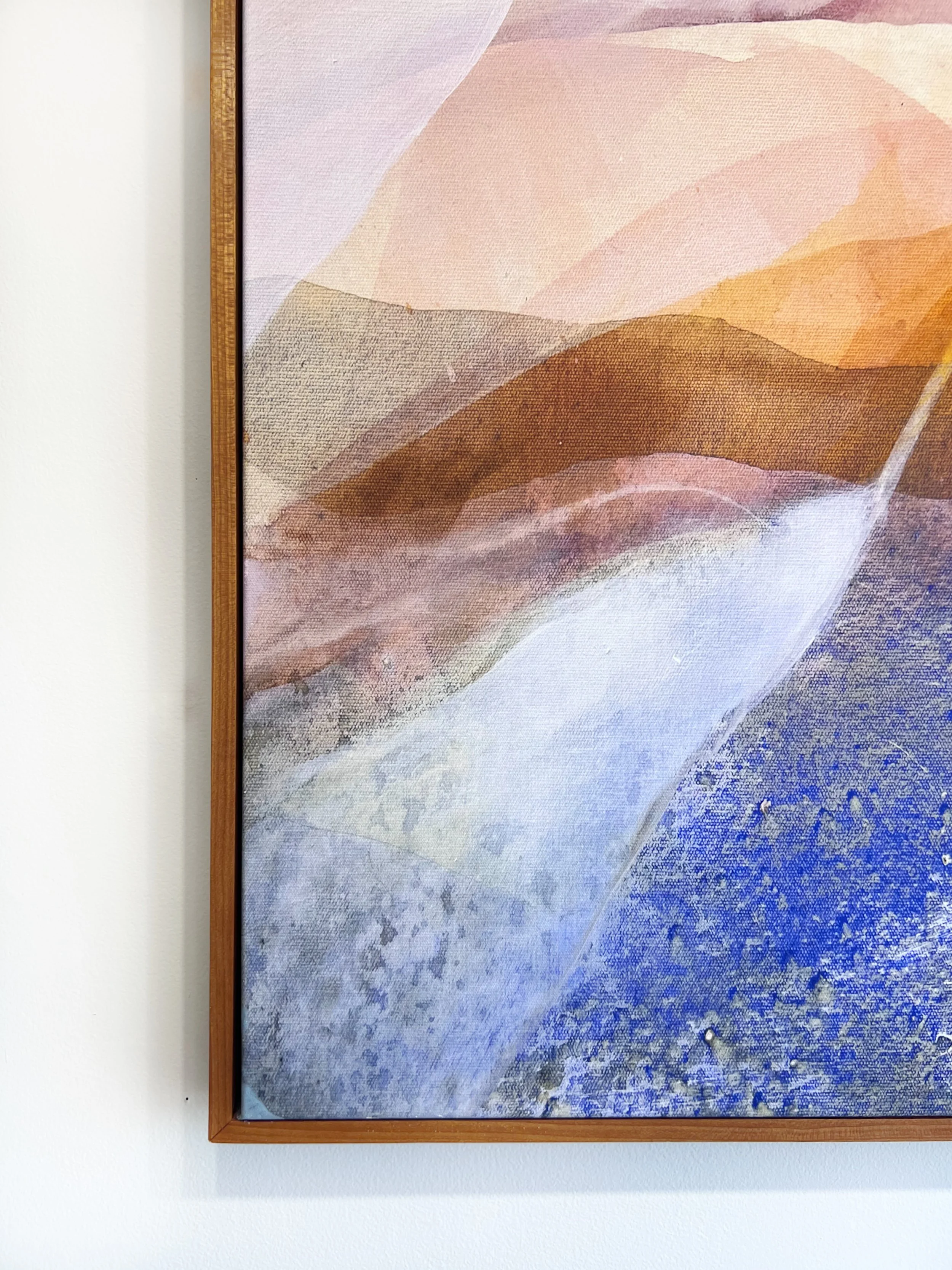 A portion of the Dogtown Canvas fine art print mounted on a white wall.