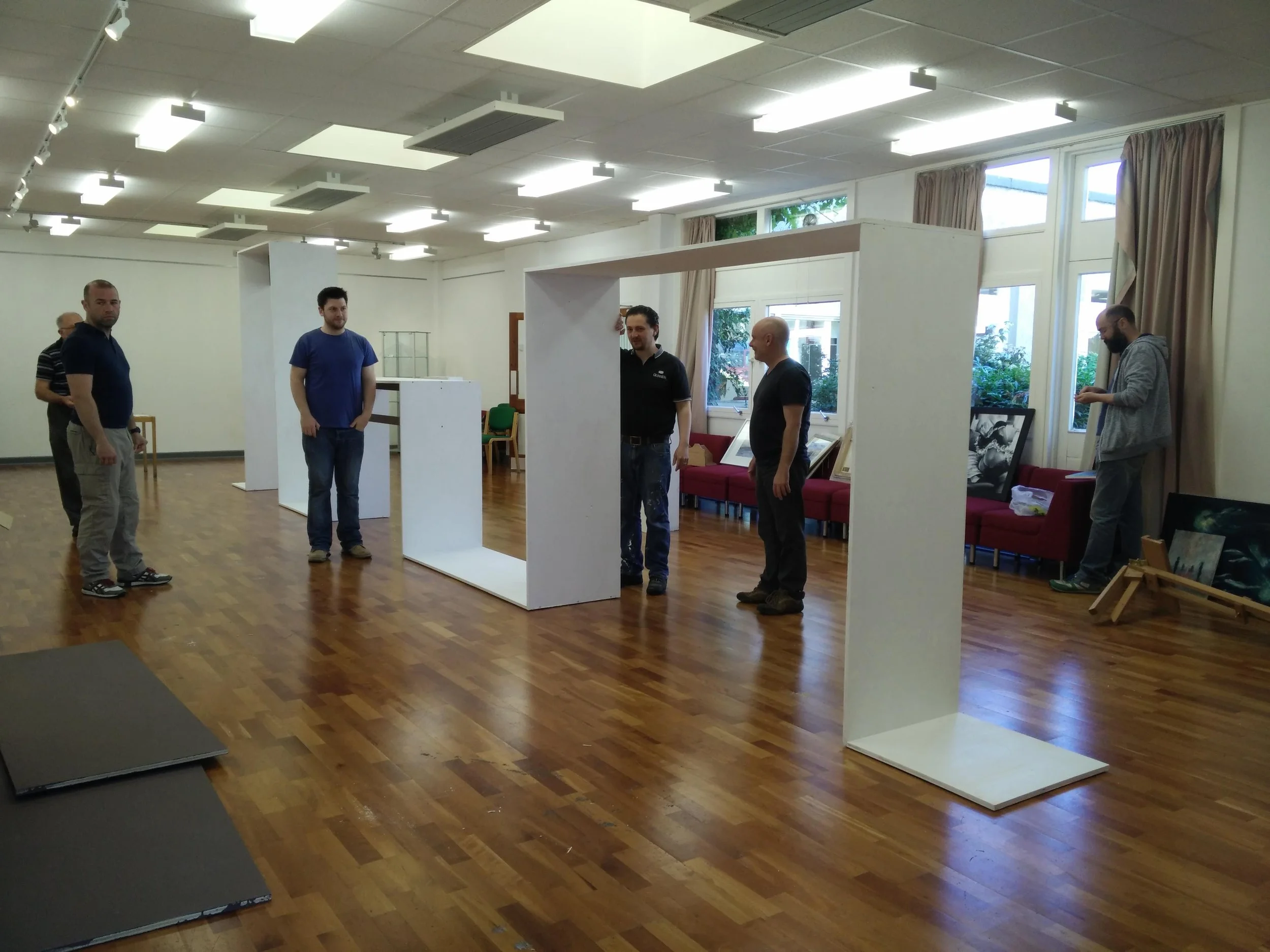 Installing the Exhibition Ribbon at Unexpected Art