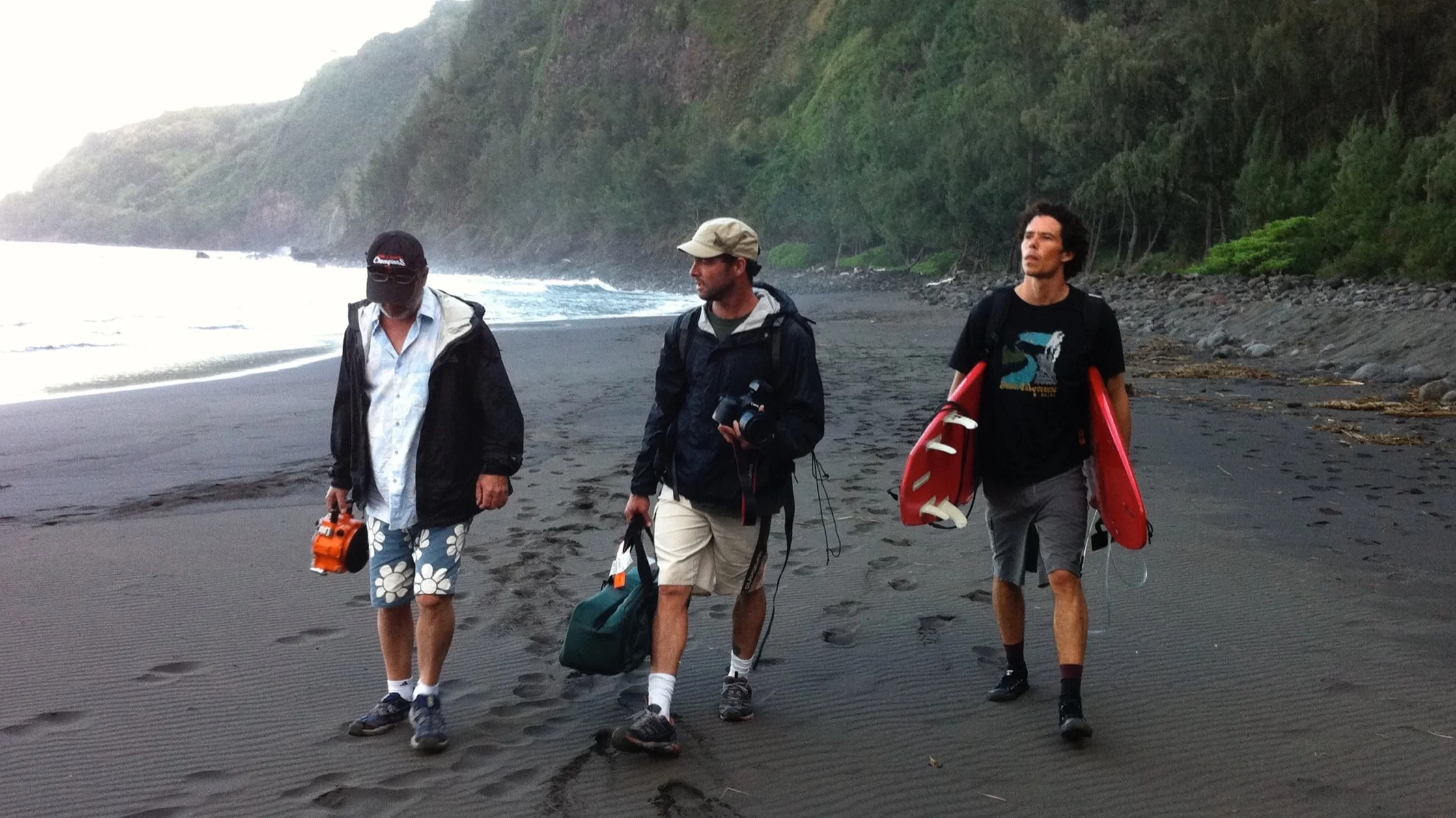 Filming Saltwater Buddha surfing in Waipio Valley Hawaii.
