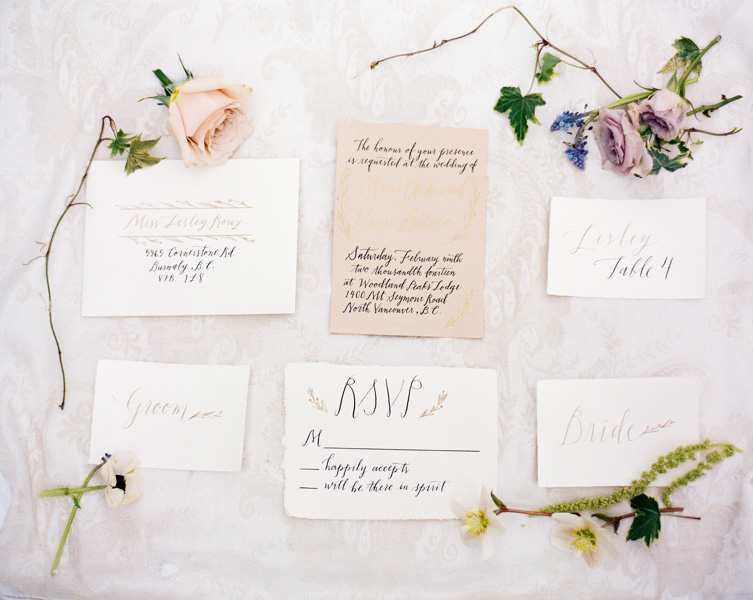  A ethereal shoot on Mt. Seymour reminiscent of blush tones on bright white snow. Gold and black ink. Photo by  Nadia Hung Photography . Calligraphy by  Fox and Flourish .&nbsp;All handmade paper from Paper-Ya. 