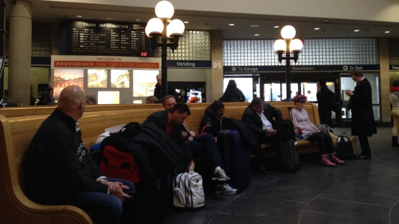 Commuters and travelers wait for their train in Providence