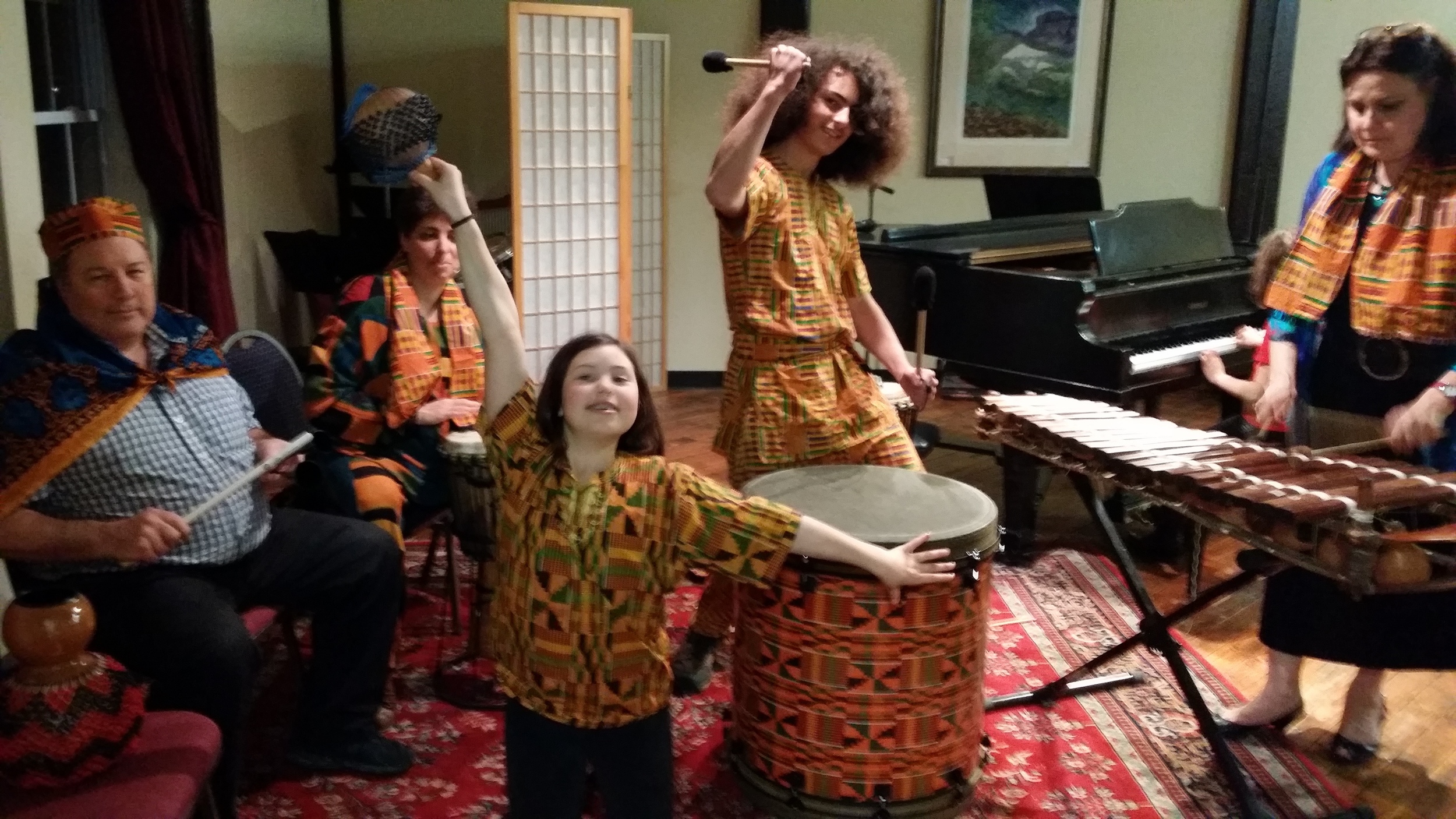 The Mumbo Jumbo drum group performs