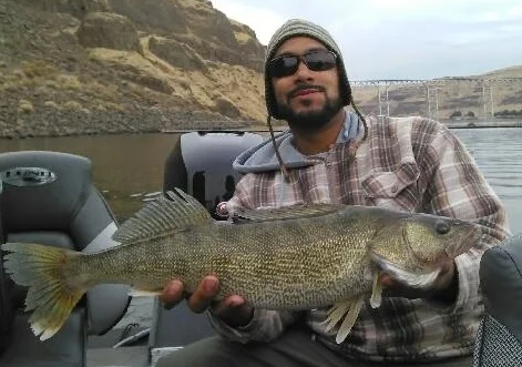 Eli with a nice Snake River walleye