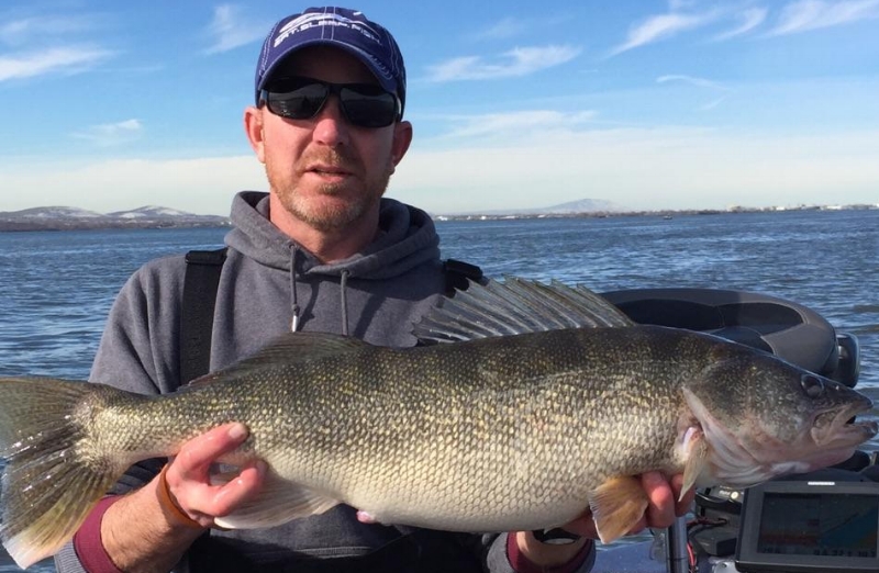 Mike caught his personal best 14.2 pound walleye below Tri Cities. February 17.