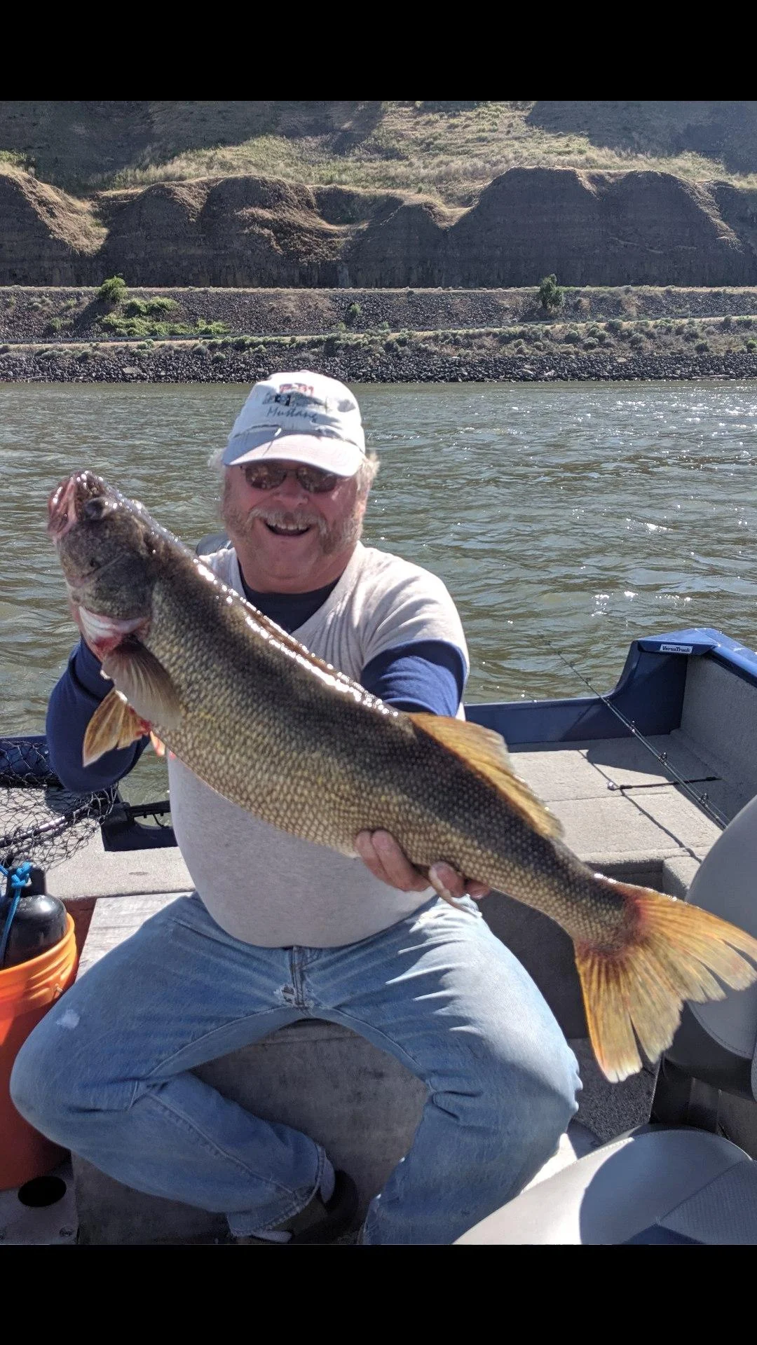 Travis put his fishing partner on this 11.7 lb walleye. Snake River. Fish released. June 8th.