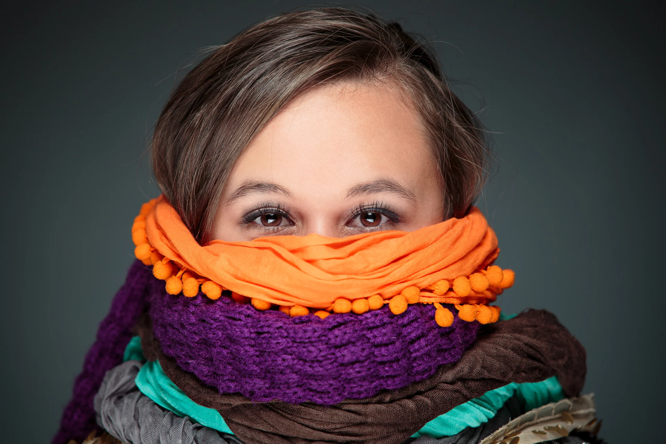 Senior in the studio showing her love for scarves!