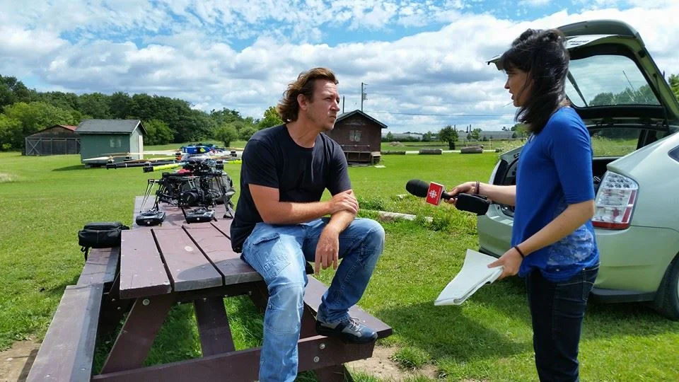 Christiaan Cloete speaks to a CBC reporter about recent UAV incidents and best practices in Toronto.