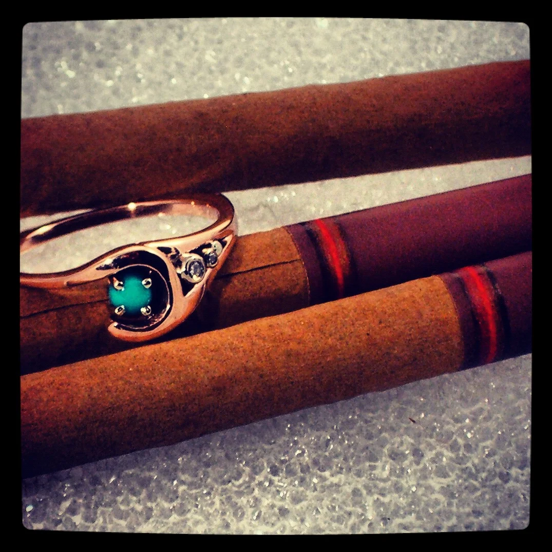 ​Turquoise with diamond accents added to a rose gold ring mounting. 