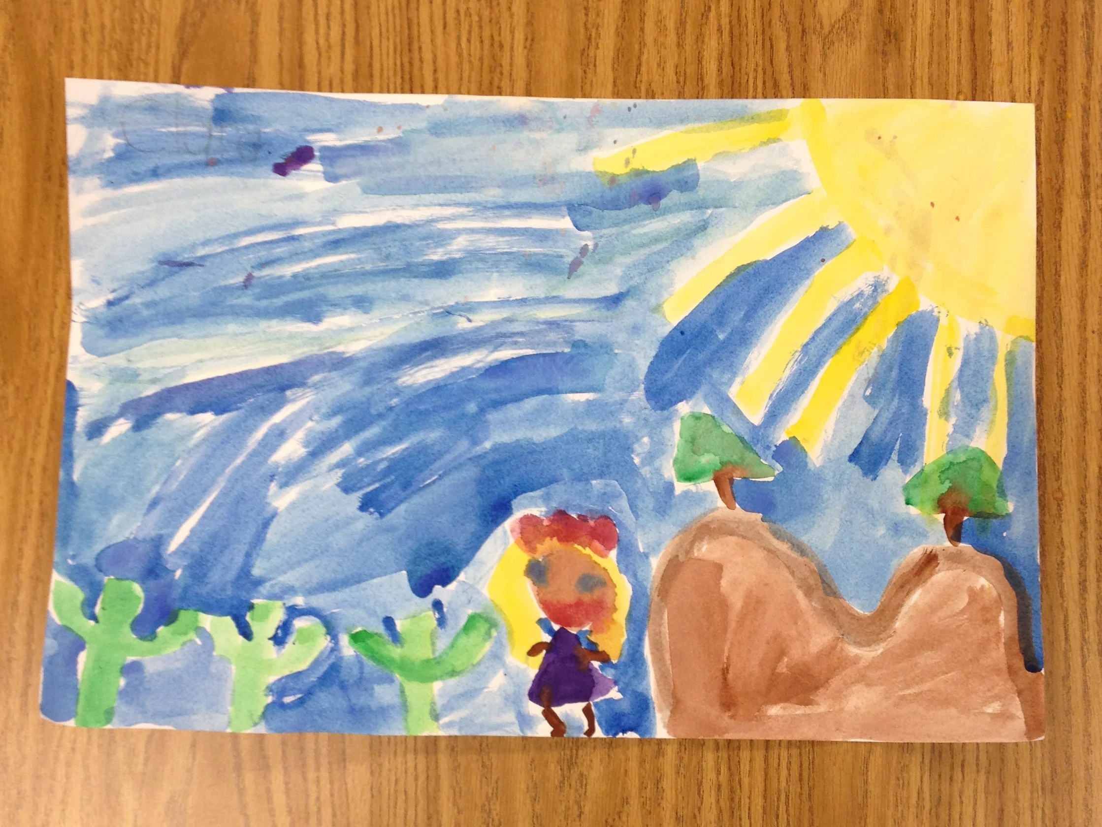 Self-portrait with mountains and sun