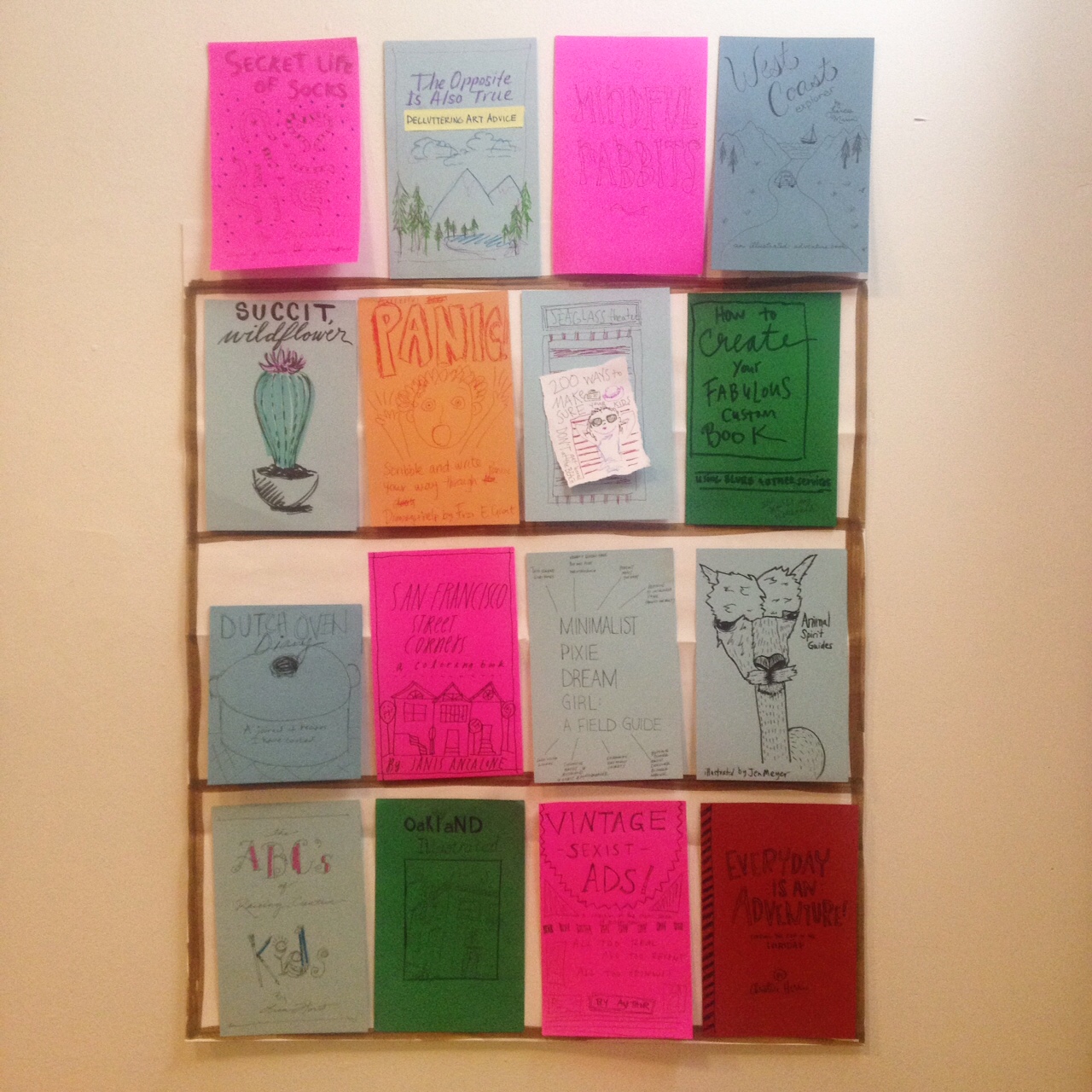Our book covers (unfortunately in bad lighting)