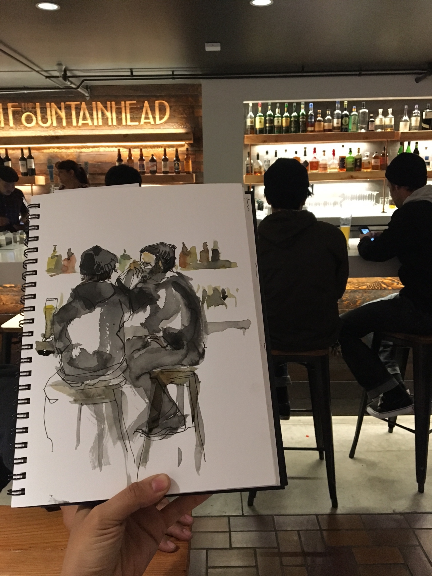 Another sketch of Suhita 's. I love the contrast of the bottles and the dark figures.