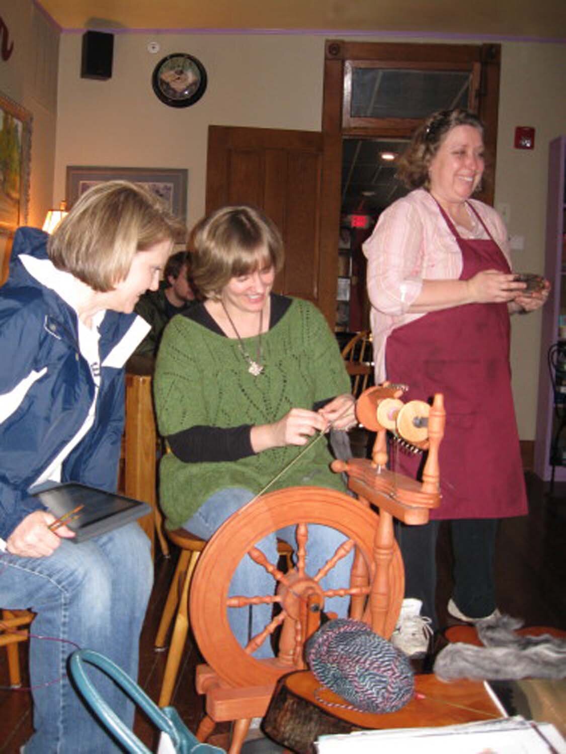 Kitty serves the knitting group.