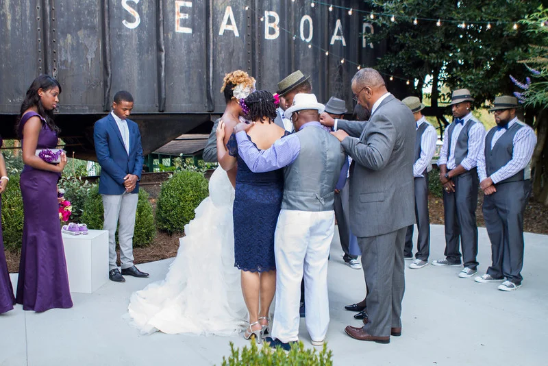One of my favorite parts of the wedding. There was a prayer of covering done by the minister and the parents of Alyssa and Reggie. While there is always so much focus on the wedding, the most important part is actually the "marriage" and to have two sets of parents lay hands and pray for their children was definitely a special moment in the ceremony.
