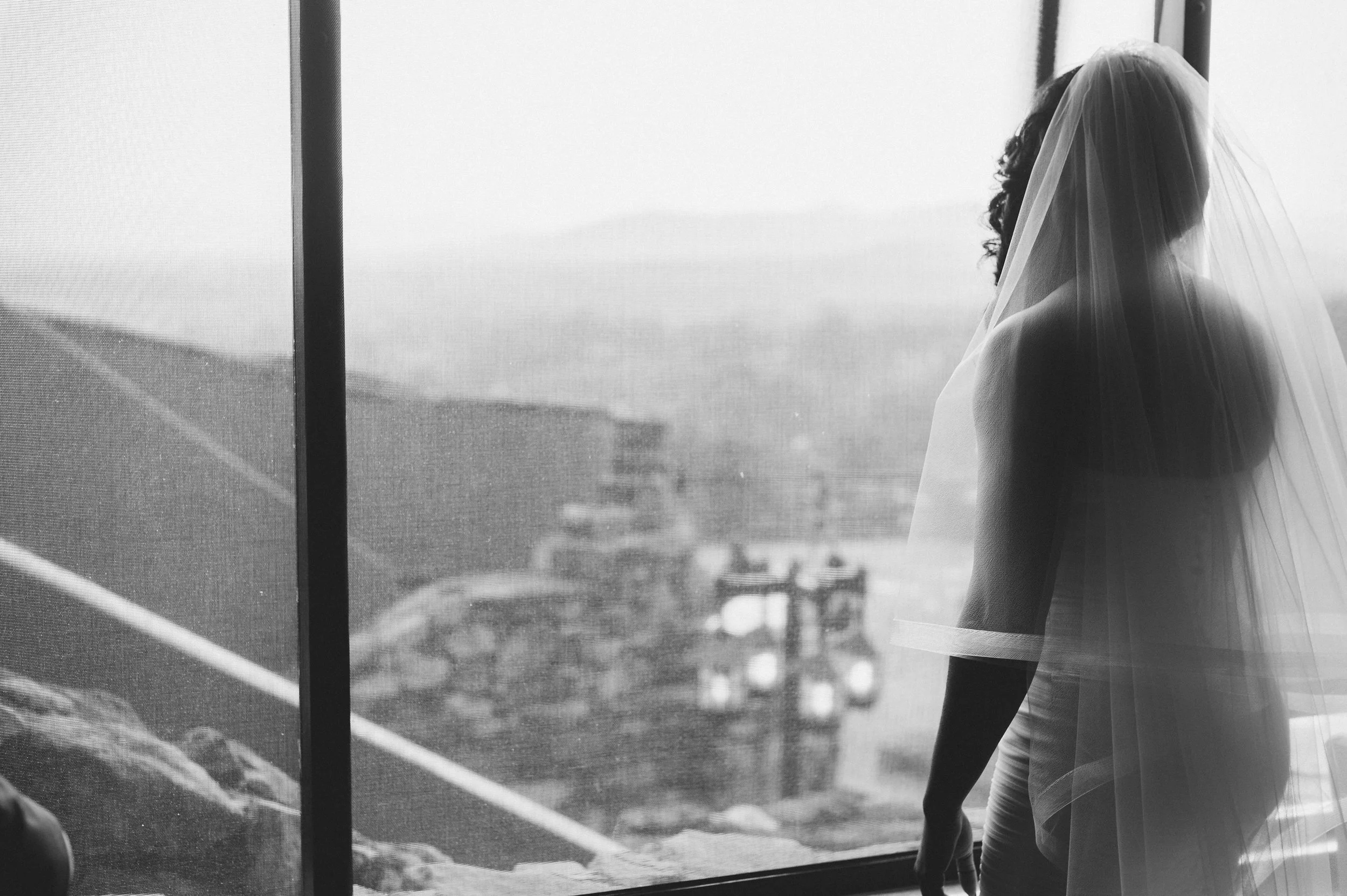 As Imani was walking through the hotel to take her place down the aisle, out of nowhere a rainstorm came, sending her guest to take cover and heavy winds to blow decor all over the ceremony location. Imani watched it all unfold from an upstairs window. Most brides would have had a total meltdown but not our Imani. She looked at her father and said, "shot time." She and her father waited the storm out in the hotel bar conversing with hotel guest and having a good time. See why we love her……