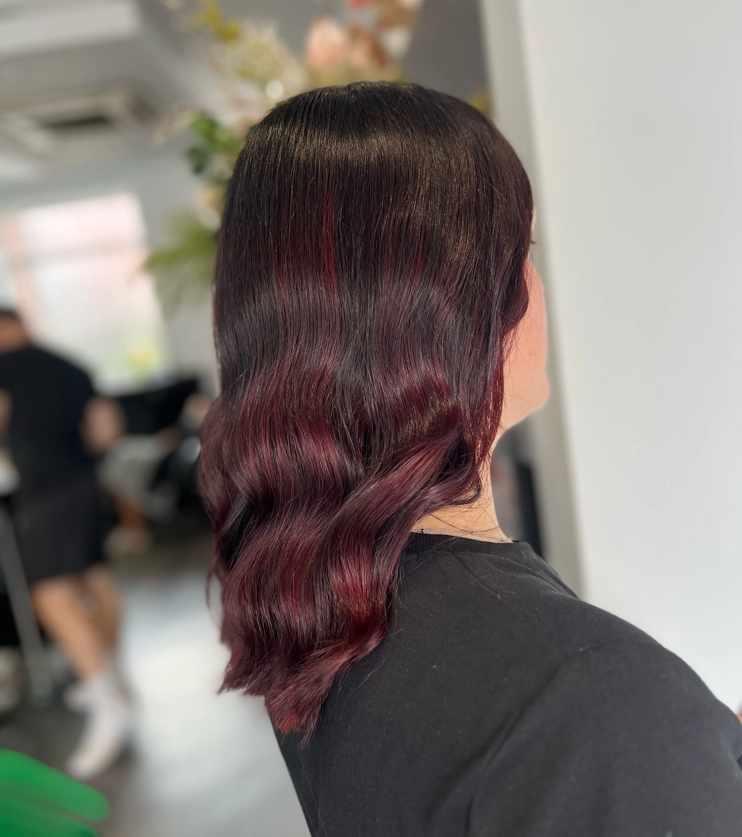Deep chocolate Brown blended with rich burgundy cherry-red tones.

Grant also added subtle hints of plum that POPS when the light hits. 💡🍒