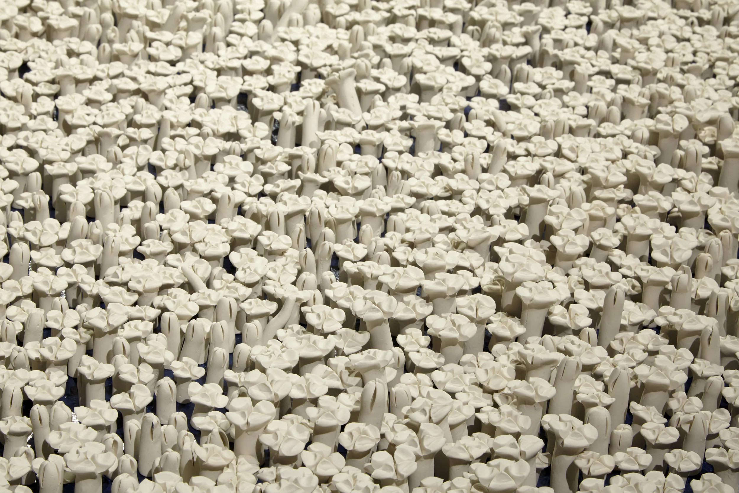    Out of the Blue Black (detail)   Polymer clay 13' Dia. 2018  Photograph by Luke Walter Photography 