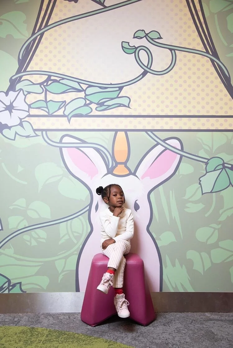    A Garden Party (Installation view)   Digital print on wall paper 13' x 160' 2018    Location: Washington, DC | West End Library    Model: Parker Curry  Photograph by Marvin Joseph for the Washington Post 