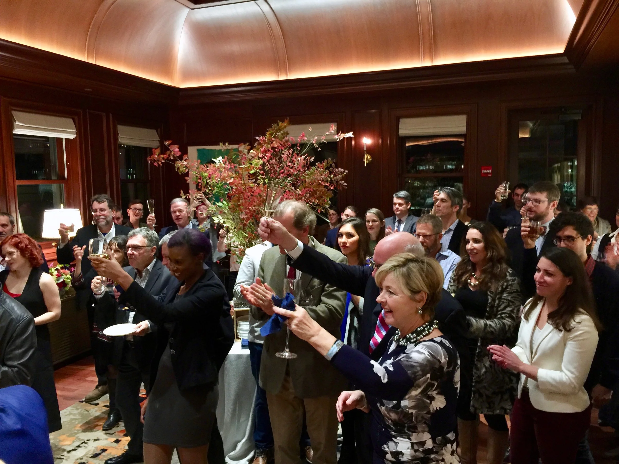Guests raise a glass to support local artists!